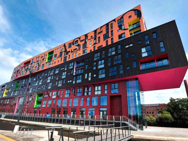 <span>City Centre Apartments</span><i>→</i>